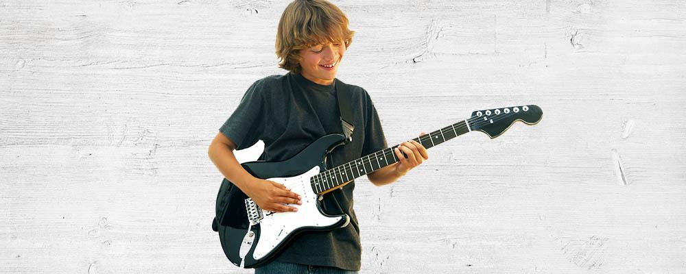 Beginner Playing Electric Guitar