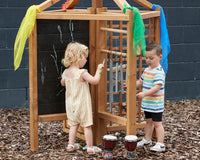Children playing outside with furniture from Cosy