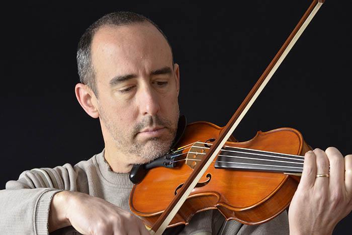 adult-playing-violin-normans-music