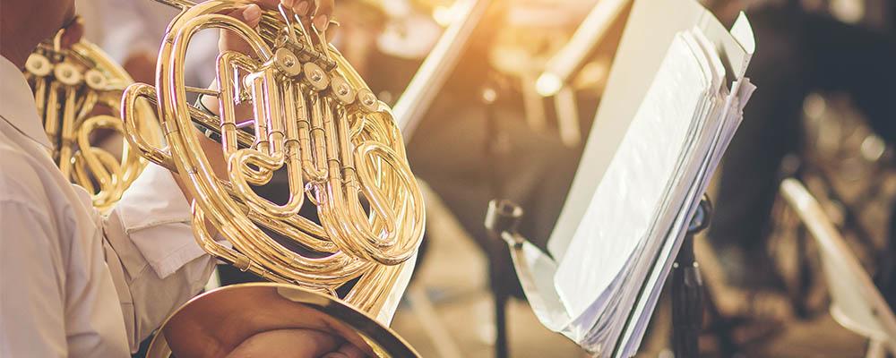 Man Playing French Horn