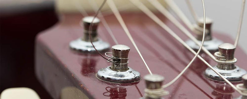 maintenance - How can I stop my electric guitar strings from