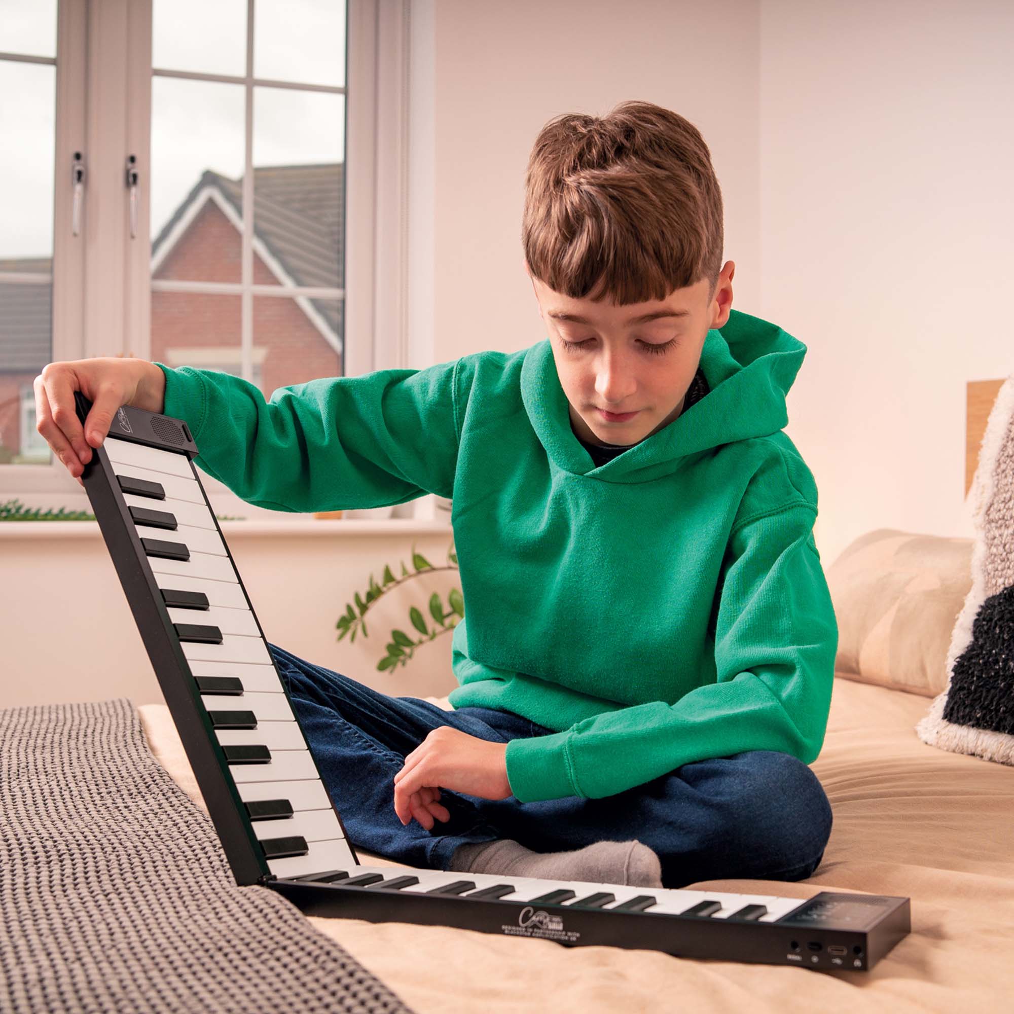 Carry-On 49 Key Touch Sensitive Folding Piano#Colour_Black