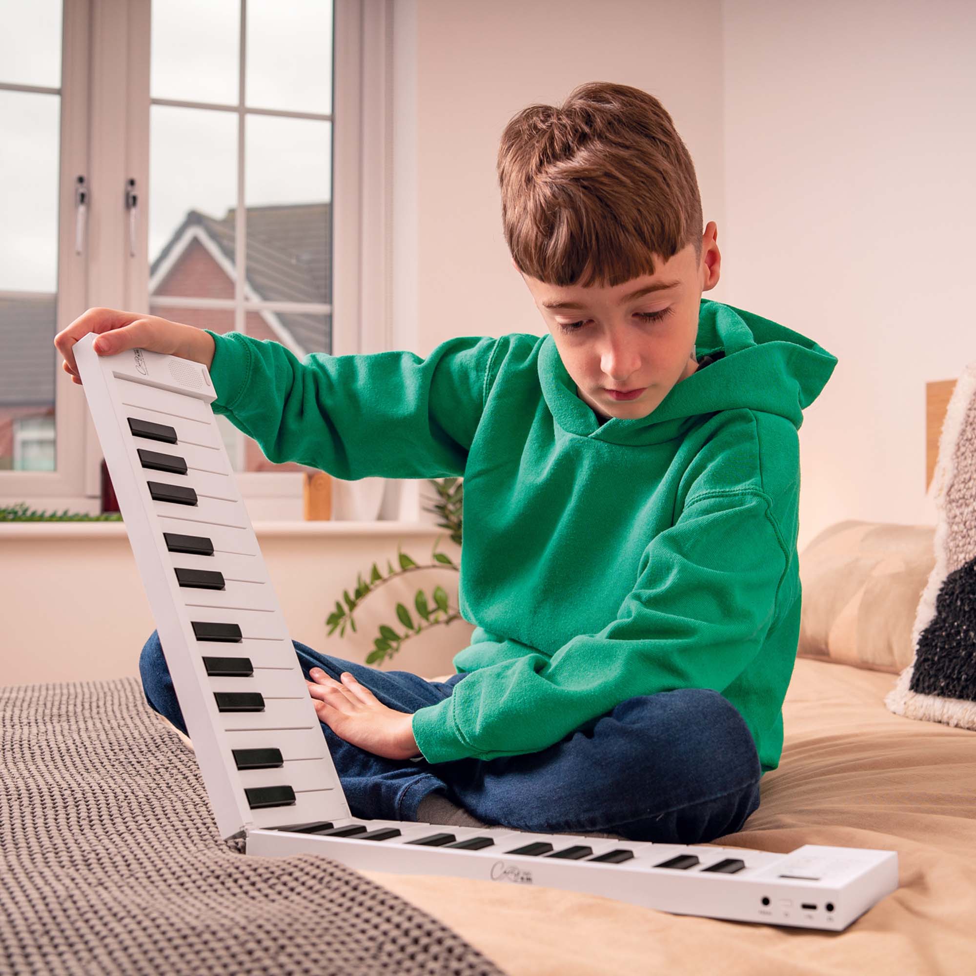 Carry-On 49 Key Touch Sensitive Folding Piano#Colour_White